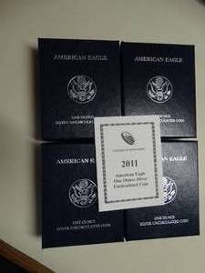 lot 1653 image: (4) - 2011 U.S. Mint  American Eagle One Ounce Uncirculated Silver Coin w Box and COA