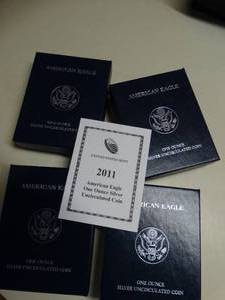 lot 1654 image: (4) - 2011 U.S. Mint  American Eagle One Ounce Uncirculated Silver Coin w Box and COA