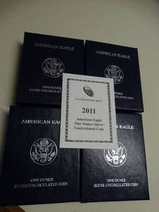 lot 1655 image: (4) - 2011 U.S. Mint  American Eagle One Ounce Uncirculated Silver Coin w Box and COA