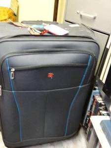 lot 1698 image: Large Swiss Rolling Suitcase w 2 Give-away Bags
