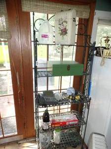 lot 1901 image: Content on Metal Rack Only Storage Boxes  Camera  Lights  Phone  Vase 