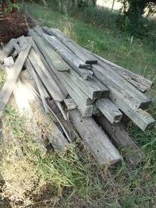 lot 1955 image: Misc. lumber including 3 Huge Telephone Poles