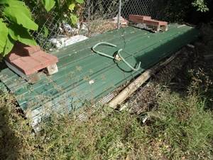 lot 1972 image: A Few Green Metal Siding  Roofing  Edge Pieces