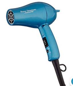 lot 49039 image: BABYLISS PRO NANO TITANIUM 1000 WATT FOLDABLE MINI HAIRDRYER