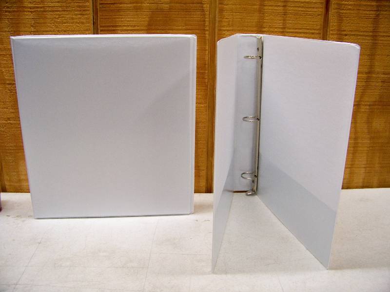 lot 13 image: 12 Office Impressions Binders
