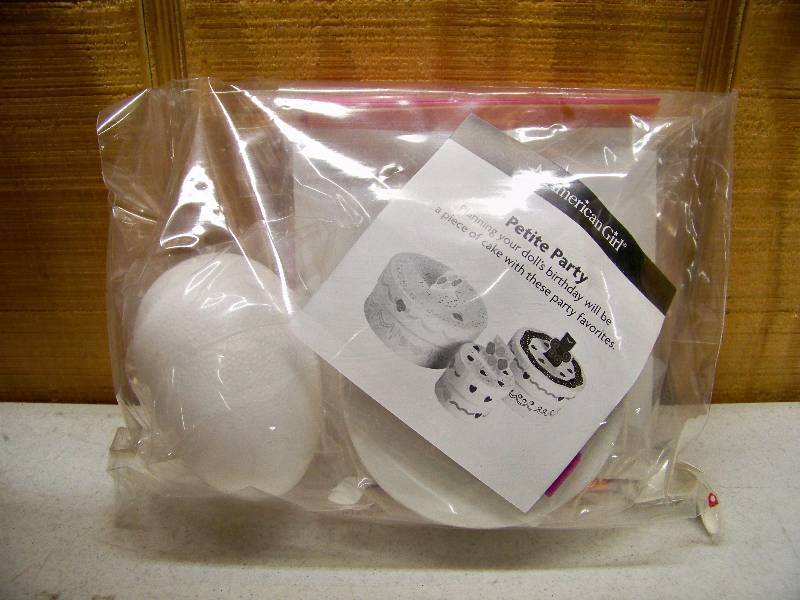lot 224 image: 11 American Girl Petite Party Favors