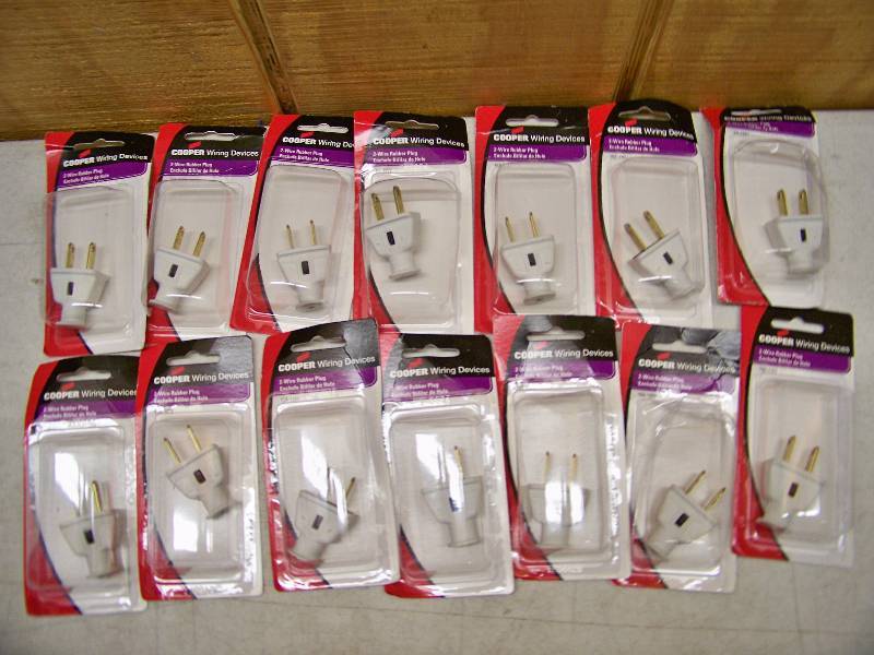 lot 291 image: 14 Cooper 2-Wire Rubber Plugs