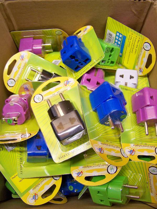 lot 297 image: 55 Multi Travel Adapters