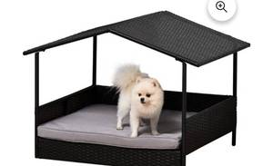 lot 10090 image: PawHut Wicker Dog House Elevated Raised Rattan Bed for IndoorOutdoor with Removable Cushion Lounge, Cream Retail $139.99