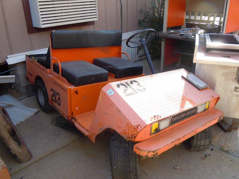 lot 34 image: Taylor Dunn Industrial Utility Golf Cart Electric Vehicle