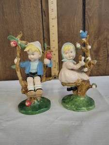 lot 1276 image: Pair of Hummel 1950s apple tree boy and girl figurines