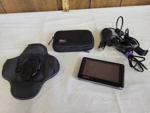 lot 1283 image: Garmin portable GPS navigator wbag and accessories