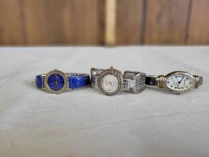 lot 1288 image: 2 Geneva and one unmarked womens wristwatches
