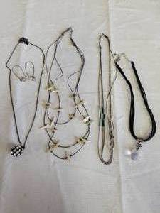 lot 1293 image: 4 necklaces and a pair of earrings
