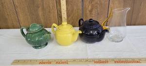 lot 1323 image: Teapots and glass pitcher