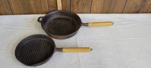 lot 1556 image: Cast iron cooking pans wwooden handles