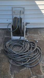 lot 125 image: Hose Reel and 2 Heavy Duty Hoses