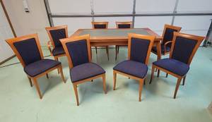 lot 243 image: Sillala Table (From Spain) and (8) Chairs - 65 x 36 x 31 - Table Extended is 107 - 1 chair has been repaired see pics