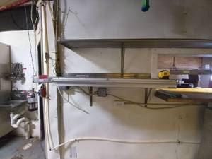 lot 2470 image: Stainless steel shelf with ticker holder