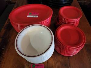 lot 8761 image: Lot of (44) Red Plastic Dinner Plates - 3 Sizes - and 10 Salad Bowls