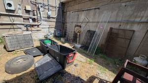 lot 6997 image: Large Sterlite Storage Containers W Lids, Metal Shelves, and More