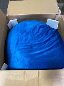 lot 73798 image: Blue velvety Bean Bag Unknown Size but the box its in measures 60H x 23 W x 21 D
