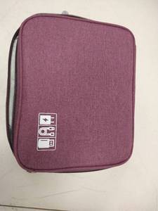 lot 3353 image: Small purple travel organizer bag