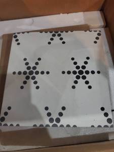 lot 142 image: Handmade Paris in White and Black Tile, Pack of 12 (Morocco)- Retail$115.99