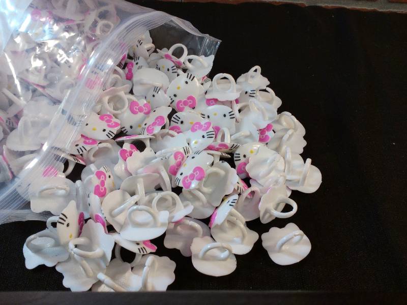 lot 89 image: HELLO KITTY RINGS FOR Parties or Cupcake toppers