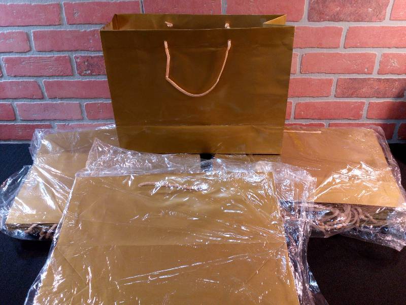 lot 144 image: Gold Gift Bags