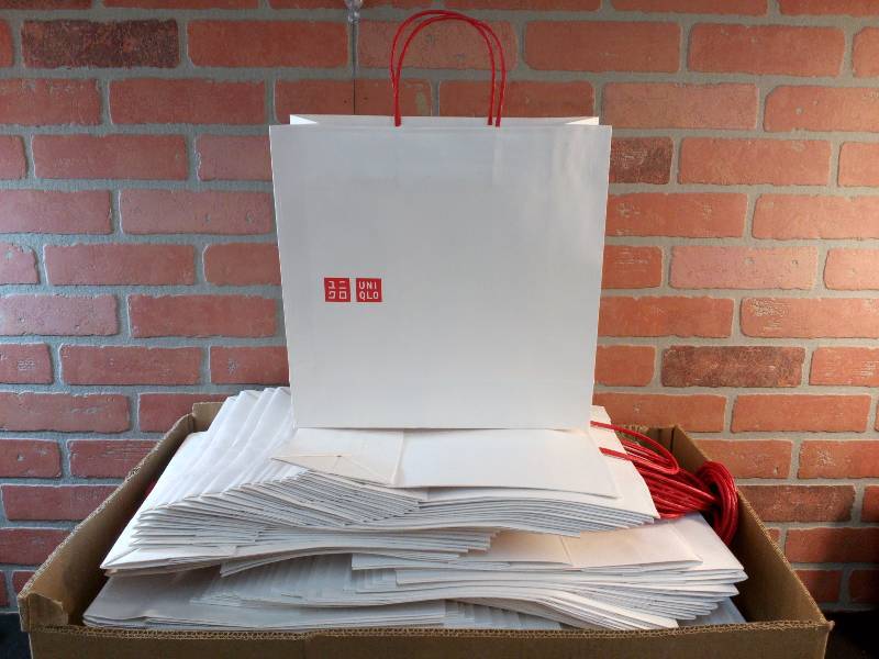lot 156 image: White Paper Gift Bags With Red Handle