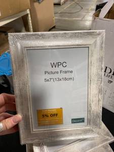 lot 42157 image: Set Of 4 Silver And White Distressed Look Picture Frames