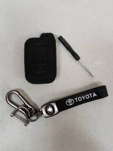 lot 7141 image: Toyota key fob holder and keychain set