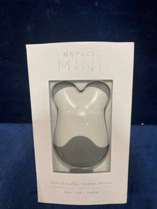 lot 75652 image: MINI Facial Toning Device
