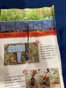 lot 75740 image: IEVEY PLASTIC GARDEN BORDER FAUX ROCKS