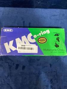 lot 75741 image: KMC O-RING MOTORCYCLE CHAIN ISO-9001 GOLD AND BLACK