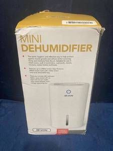 lot 75818 image: SEVON MINI DEHUMIDIFIER