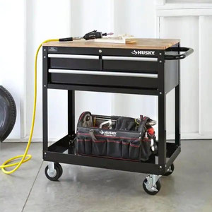 lot 23421 image: Top Only Husky 36 in. W x 17 in. D Standard Duty 3-Drawer Rolling Tool Cart with Hardwood Top in Gloss Black Retail $193.64
