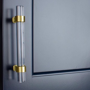 lot 23346 image: 6-14 in. Center-to-Center Clear Acrylic Cabinet Drawer Pull with Satin Gold Bases (10-Pack) Retail $49.44