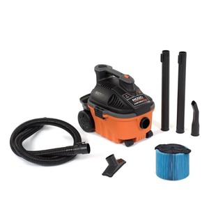 lot 23445 image: RIDGID 15L (4 Gal.) 5.0 Peak HP Portable WetDry Shop Vacuum with Large Rear Wheels & Storage. Retail $ 99.97