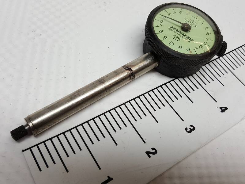 lot 8479 image: FEDERAL DIAL .001 INDICATOR MODEL B3W mounted on a shaft used in the last application at Boeing of Wichita.