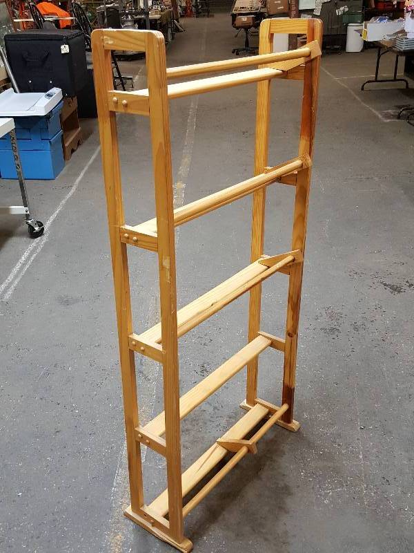 lot 8383 image: Nice looking and light weight all wood clothes or shoe rack  No clue about the original use or application
