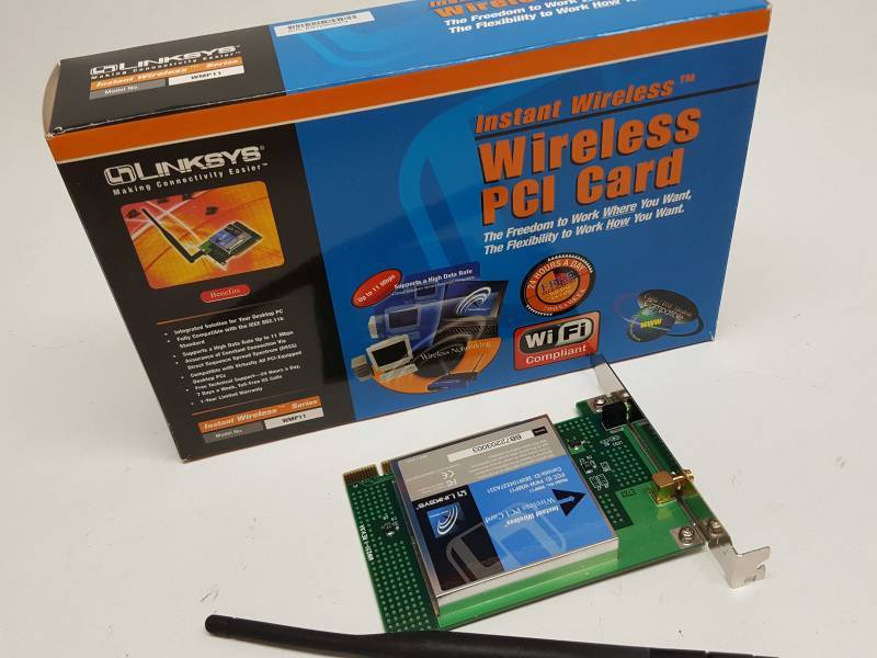lot 8395 image: New Linksys Instant Wireless PCI Card Model WMP11 and antenna and software