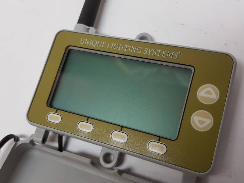 lot 8394 image: Single Unique Lighting LPRO Light Logic lawn sprinkler Programming Module w cord