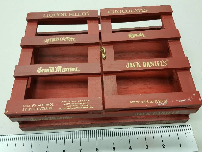 lot 8397 image: Well it looks like all the chocolates are gone but the wood box might make a cool display.