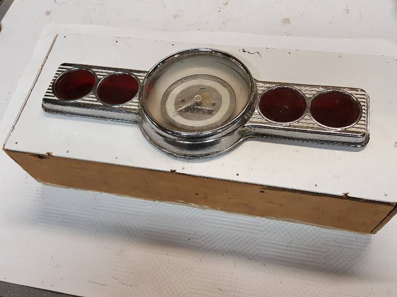 lot 8348 image: No clue to figure out what this wooden box was about.  I believe the chrome panel is out of an early Mustang