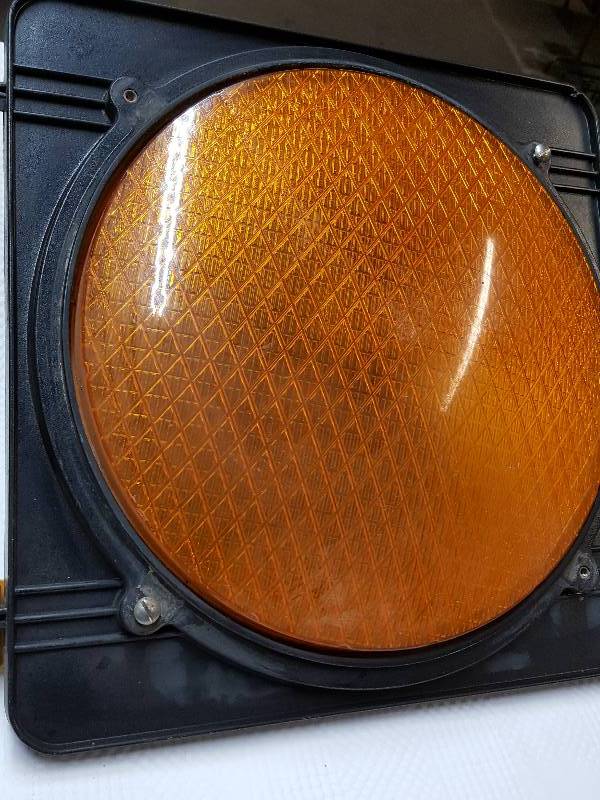 lot 8349 image: Center section out of a traffic light is this Yellow can, light and lens.  The HD box can measures 13-14 X 13-14