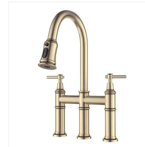 lot 2243 image: Double Handle Bridge Kitchen Faucet Gooseneck and Pull-Down Spray Head in Brushed Gold