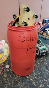 lot 23457 image: Red Barrel Of Assorted Sports Balls and (4) Wooden Scooter Boards&nbsp
