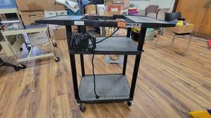 lot 9781 image: Plastic 2-Tier Rolling Cart W Outlets and a 4-Tier Metal Cart